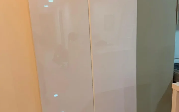 Cabinet tall gloss kitchen by BHMS in Dubai