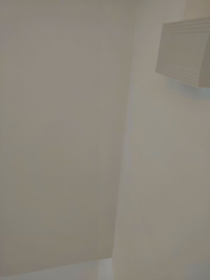 Even paint finish on wall and ceiling