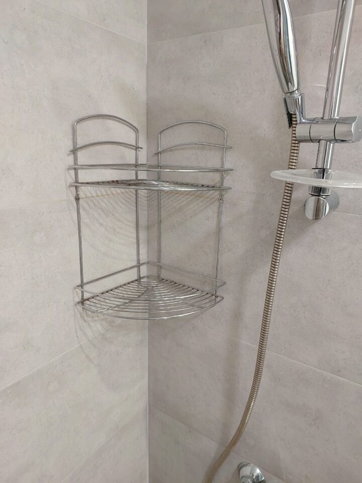 Corner shower caddy installed